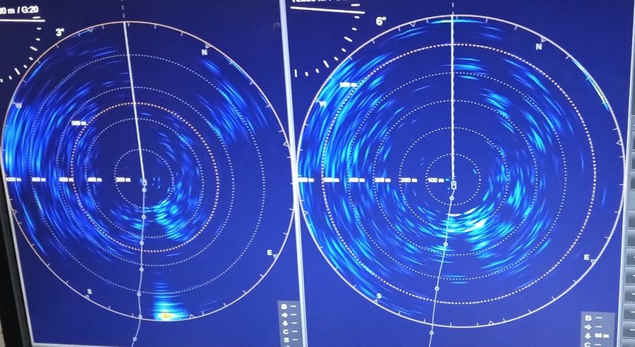 Two circular SONAR displays showing returns at different range settings